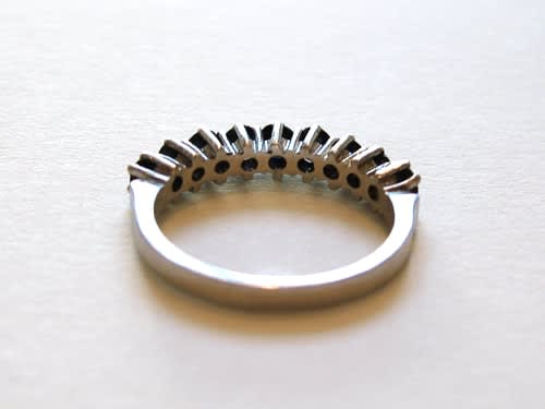 18 Karat Gold Ring Set With 9 Genuine Blue Sapphires