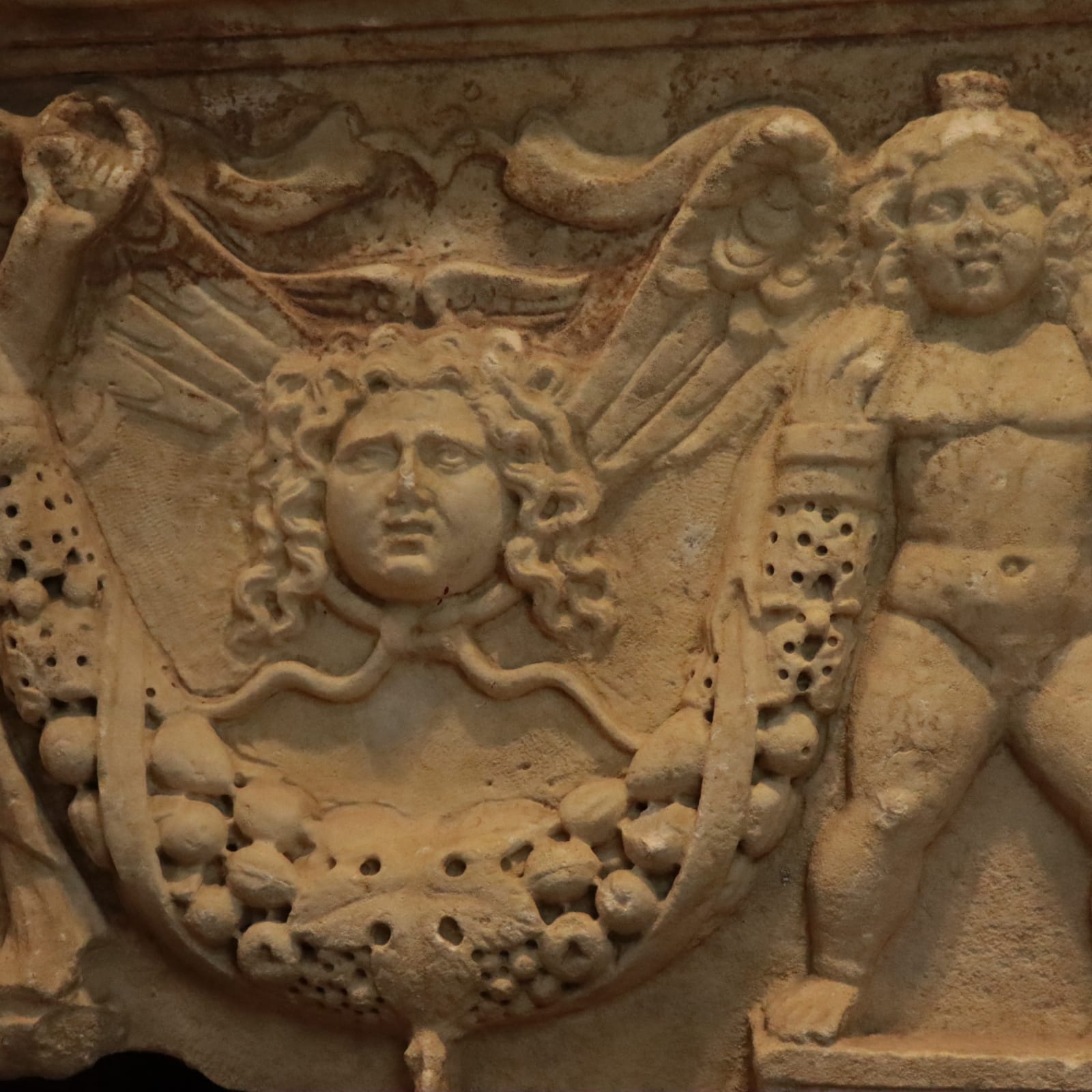 Roman marble fragment of a garland sarcophagus, 2nd Century CE