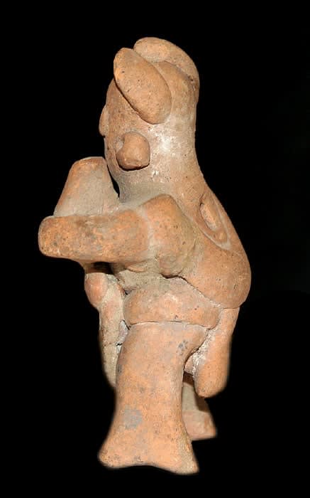 Colima Terracotta Sculpture of a Figure Holding a Vessel, 300 BCE - 200 CE