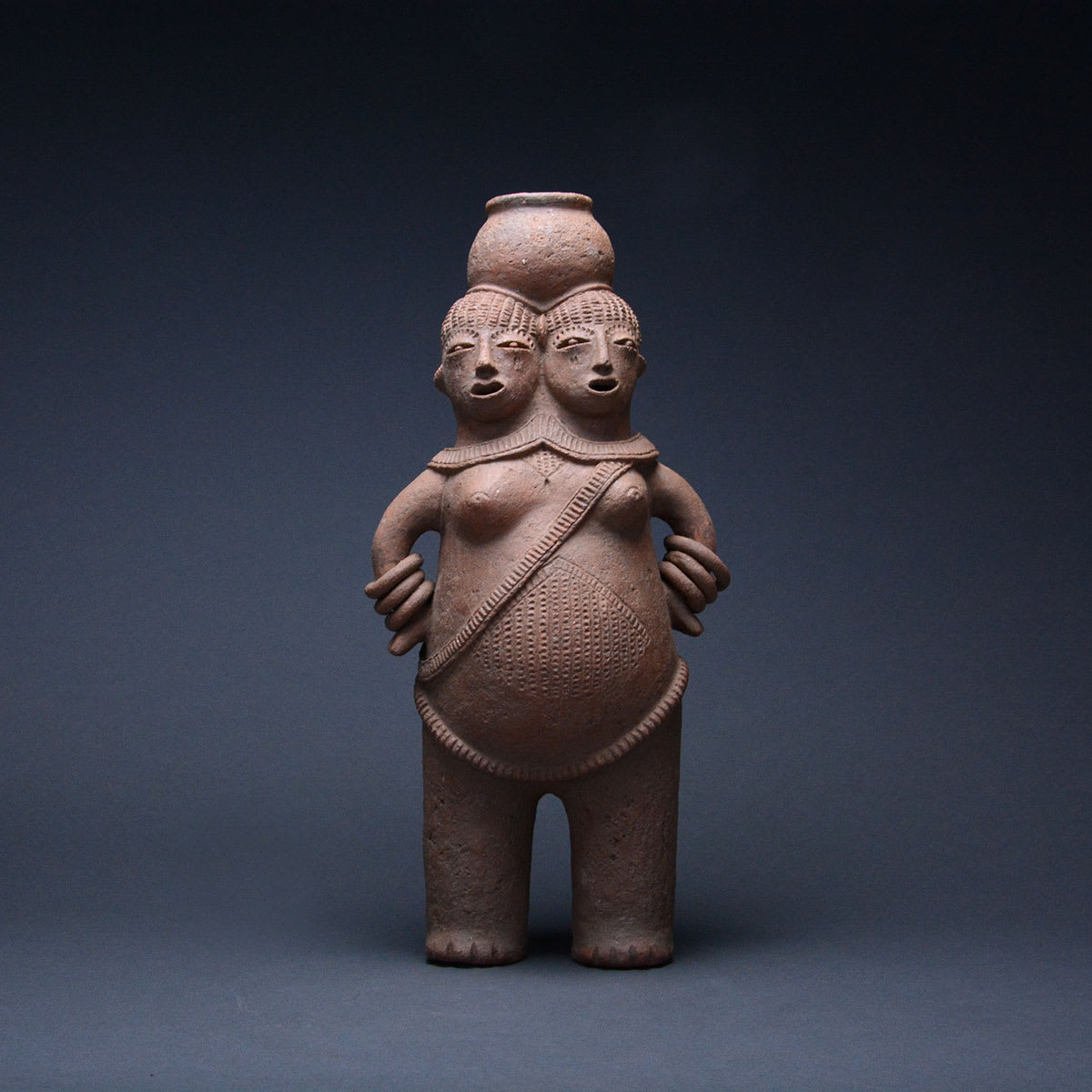 Mangbetu Terracotta Vessel in the Shape of Conjoined Twins, 19th Century CE - 20th Century CE