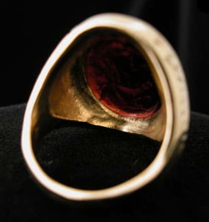 Gold Ring with Classical Revival Garnet Intaglio of a Man Feeding a Dog, 18th Century CE