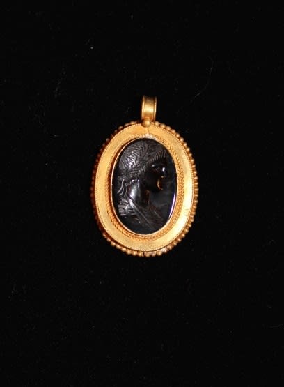 Onyx Intaglio Set in a Gold Pendant