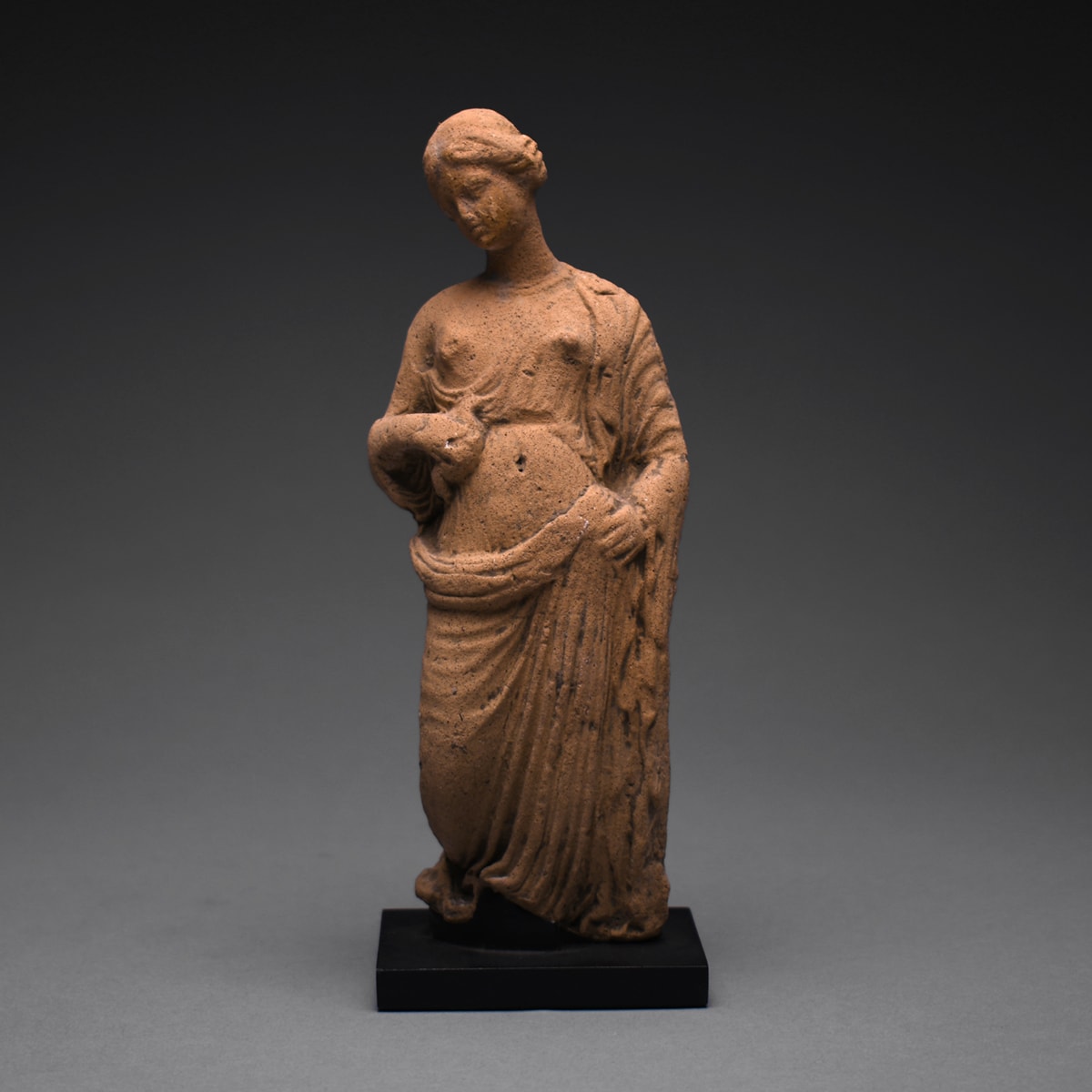 A Hellenistic Terracotta Statue of a Standing Woman