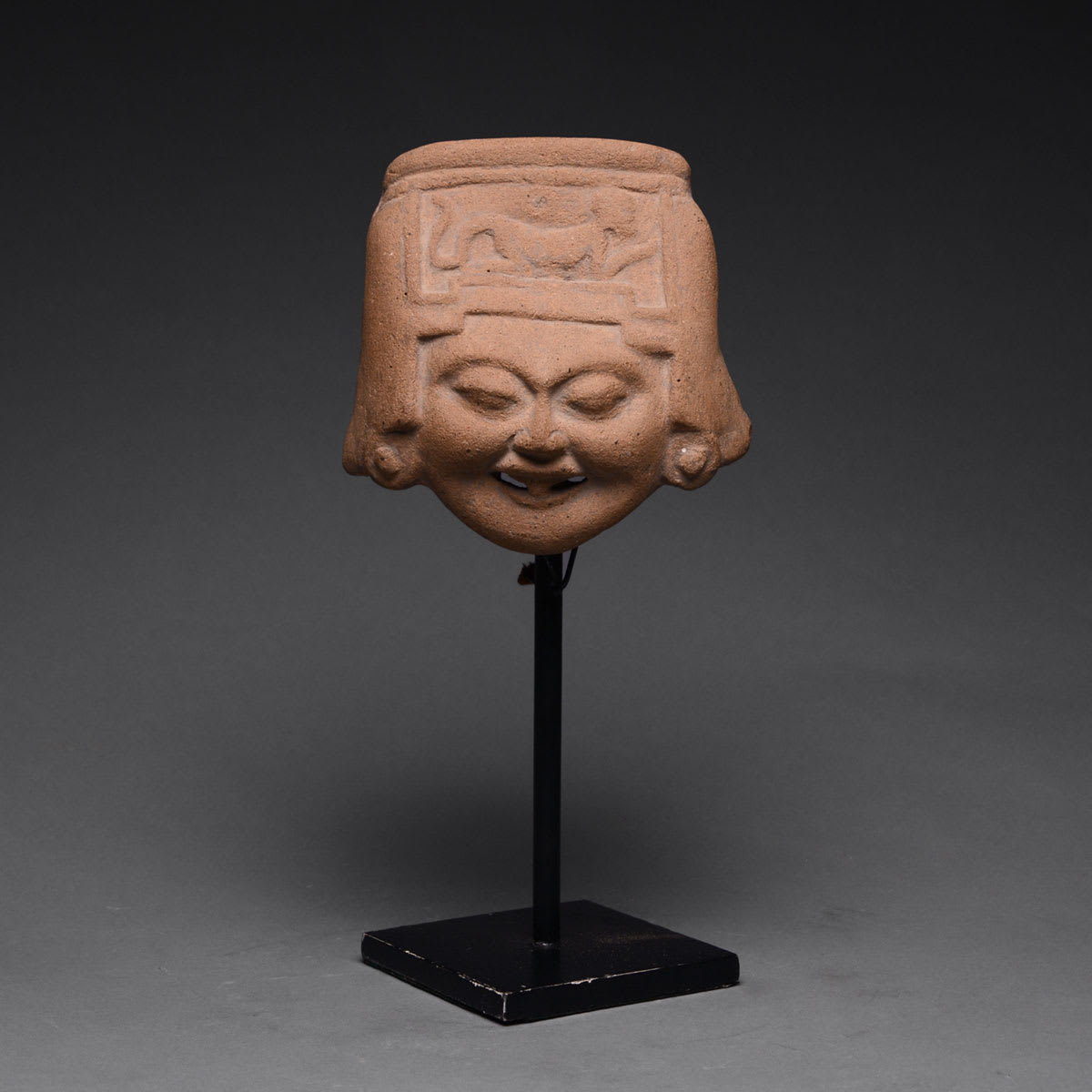 Remojadas Sculptural Fragment of a Smiling Head, 500 CE - 900 CE