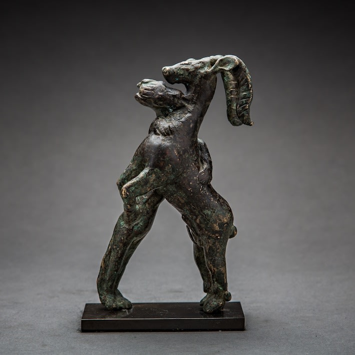 Elamite culture bronze figurine of a panther attacking a stag, 900 BCE - 600 BCE