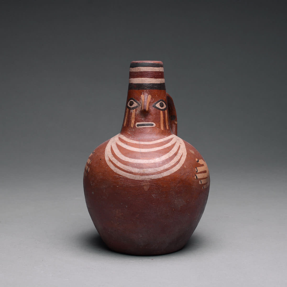 Late Nazca Painted Human Effigy Jug, 300 CE - 500 CE