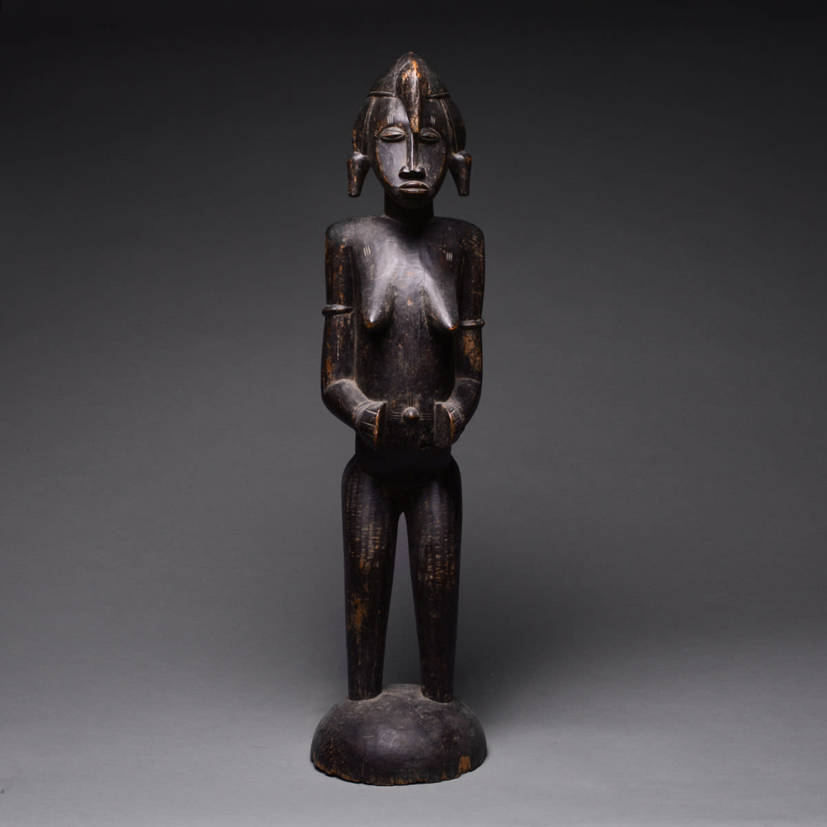 Female Senufo Wooden Pombilele Rhythm Pounder, 20th Century CE