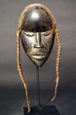 Dan Wooden Go Ge Mask with a Raffia Wig, 19th Century CE - 20th Century CE
