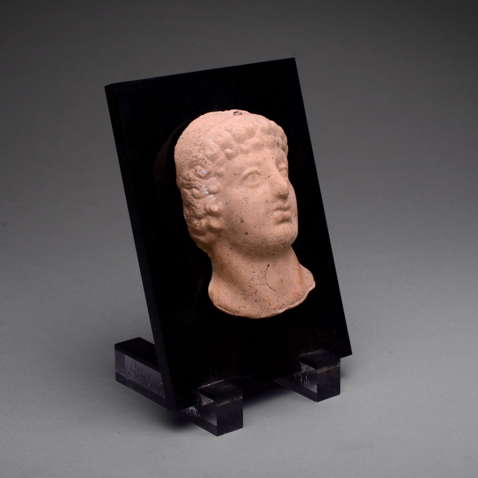 Roman Terracotta Sculpture of a Head of Emperor Domitian, 80 CE - 100 CE