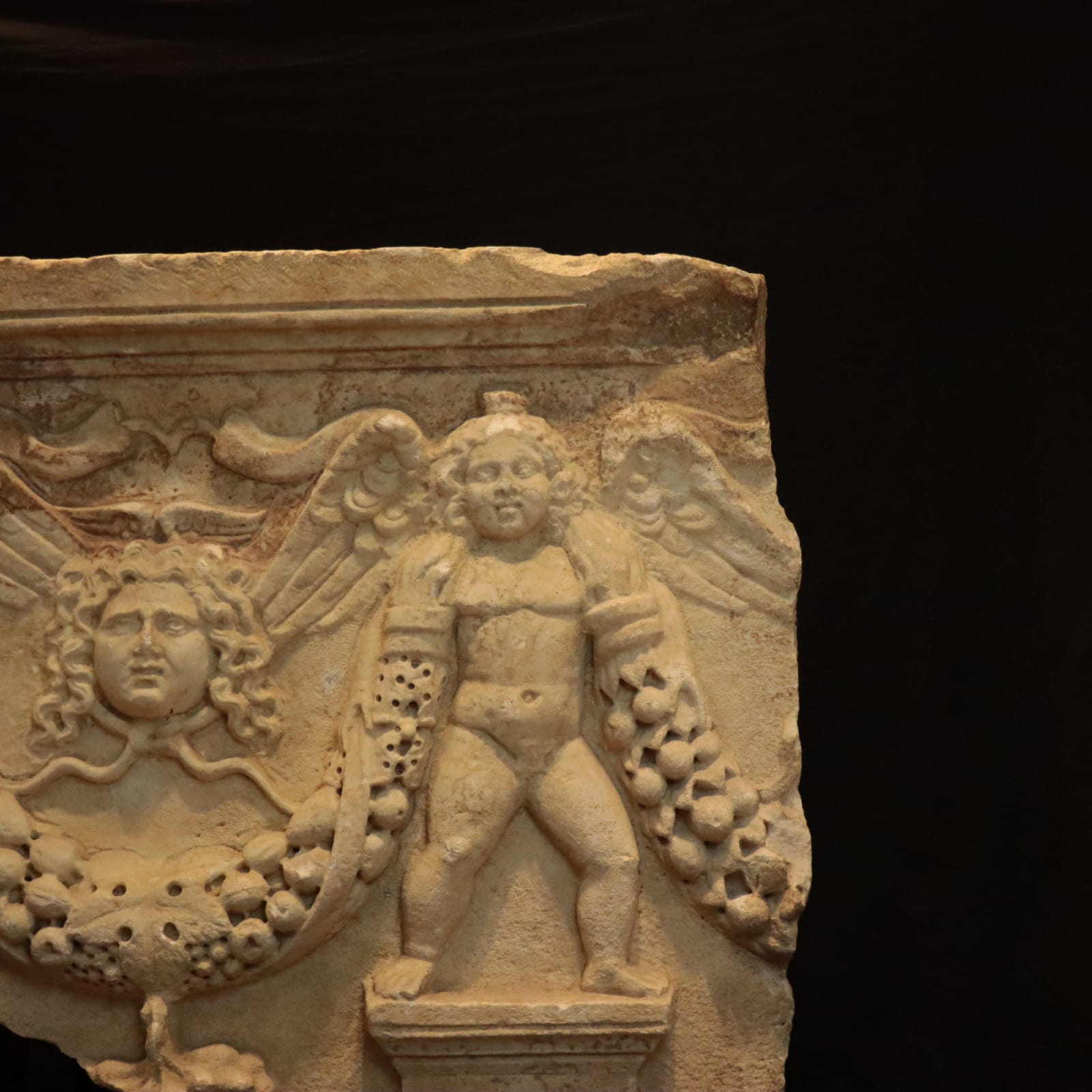 Roman marble fragment of a garland sarcophagus, 2nd Century CE