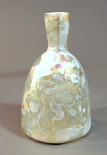 Plain Islamic Clear Glass Bottle with Domed Body and Faceted Neck, 8th Century CE - 11th Century CE