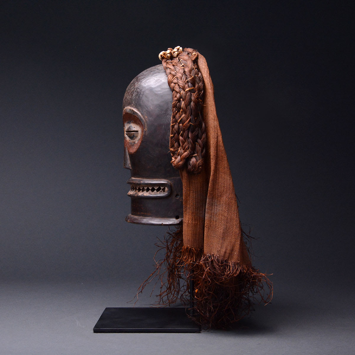 Chokwe Wooden Cihongo Mask with Cloth and Raffia Fibers, 20th Century CE