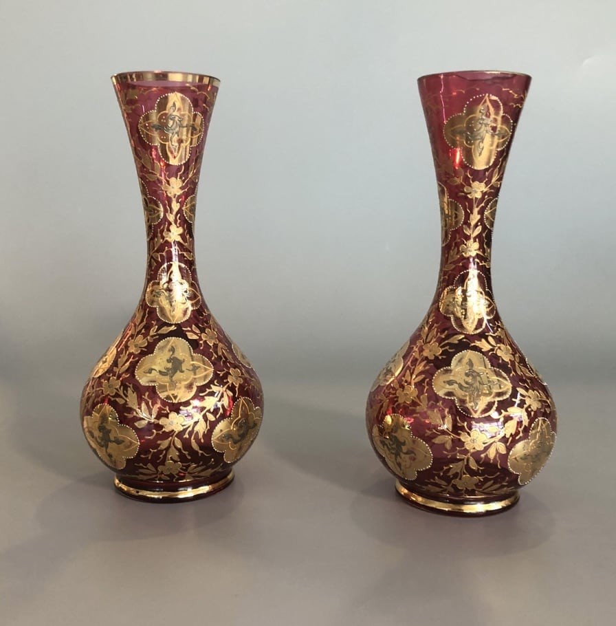 Pair of red vases with gold decoration
