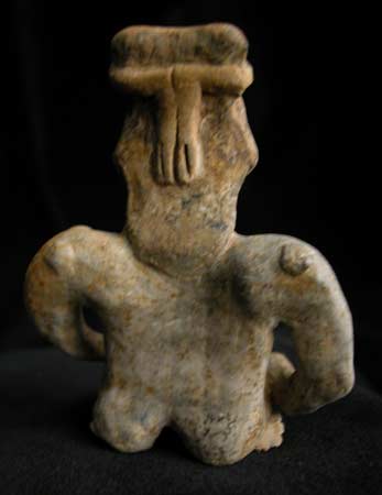Jalisco Sculpture of a Seated Man Holding a Scepter and an Offering Bowl, 300 BCE - 300 CE