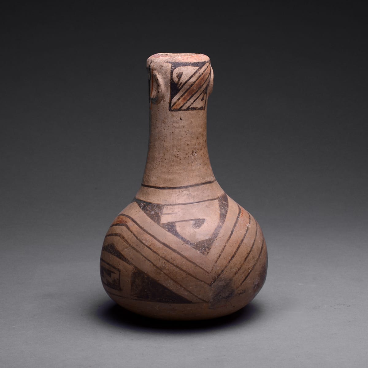 Casas Grandes Polychrome Human Effigy Vase, 1160 CE - 1260 CE