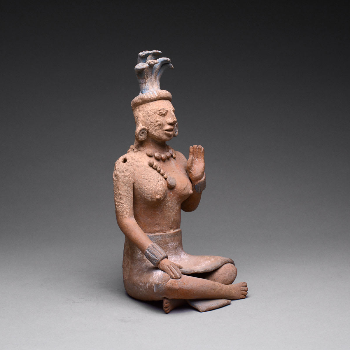 Jaina Style Mayan Terracotta Sculpture of a Seated Woman, 600 CE - 900 CE