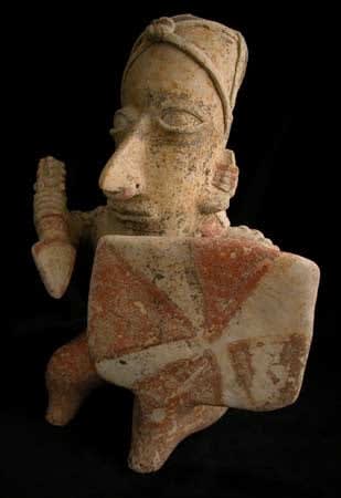Ameca-Ezatlán Style Jalisco Terracotta Seated Warrior Holding a Spear and Shield, 300 BCE - 300 CE