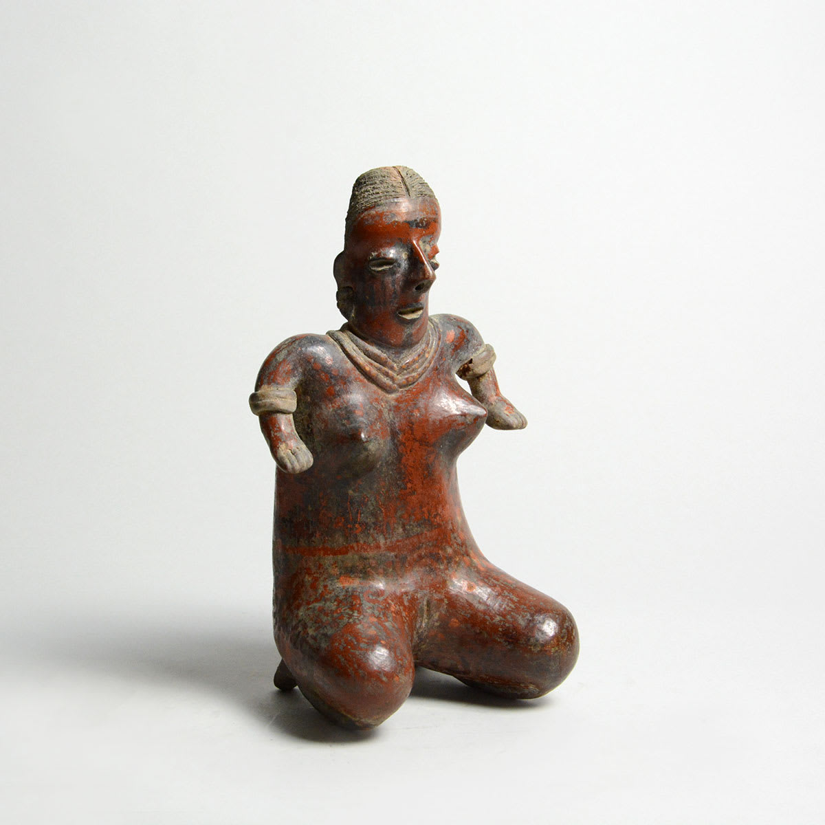 Nayarit Terracotta Sculpture of a Kneeling Woman, 300 BCE - 300 CE