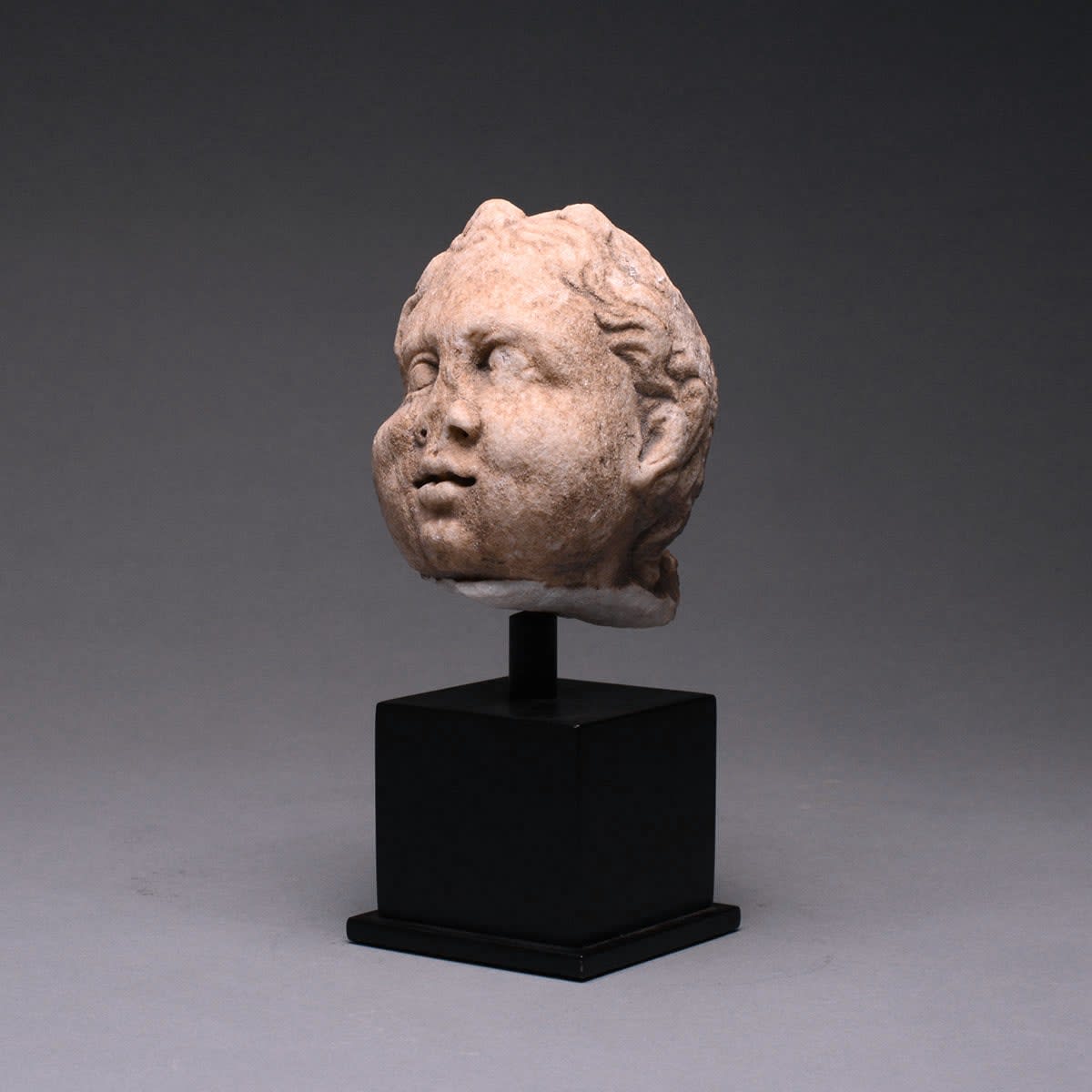 Roman Marble Head of a Child, 100 CE - 300 CE