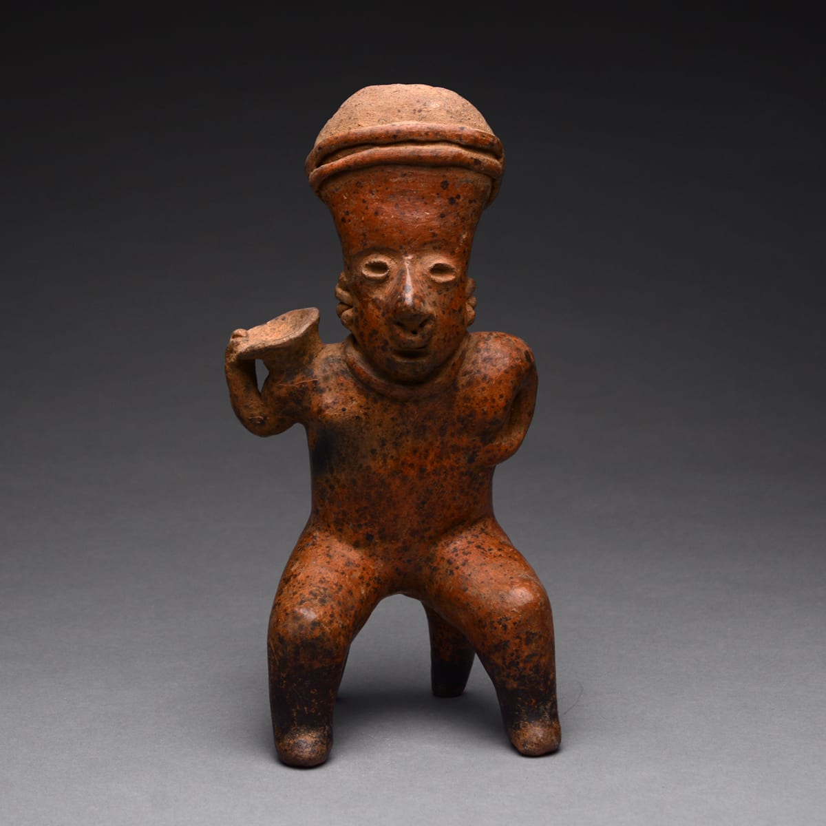 San Sebastián Style Nayarit Sculpture of Seated Woman Holding an Offering Bowl, 300 BCE - 300 CE