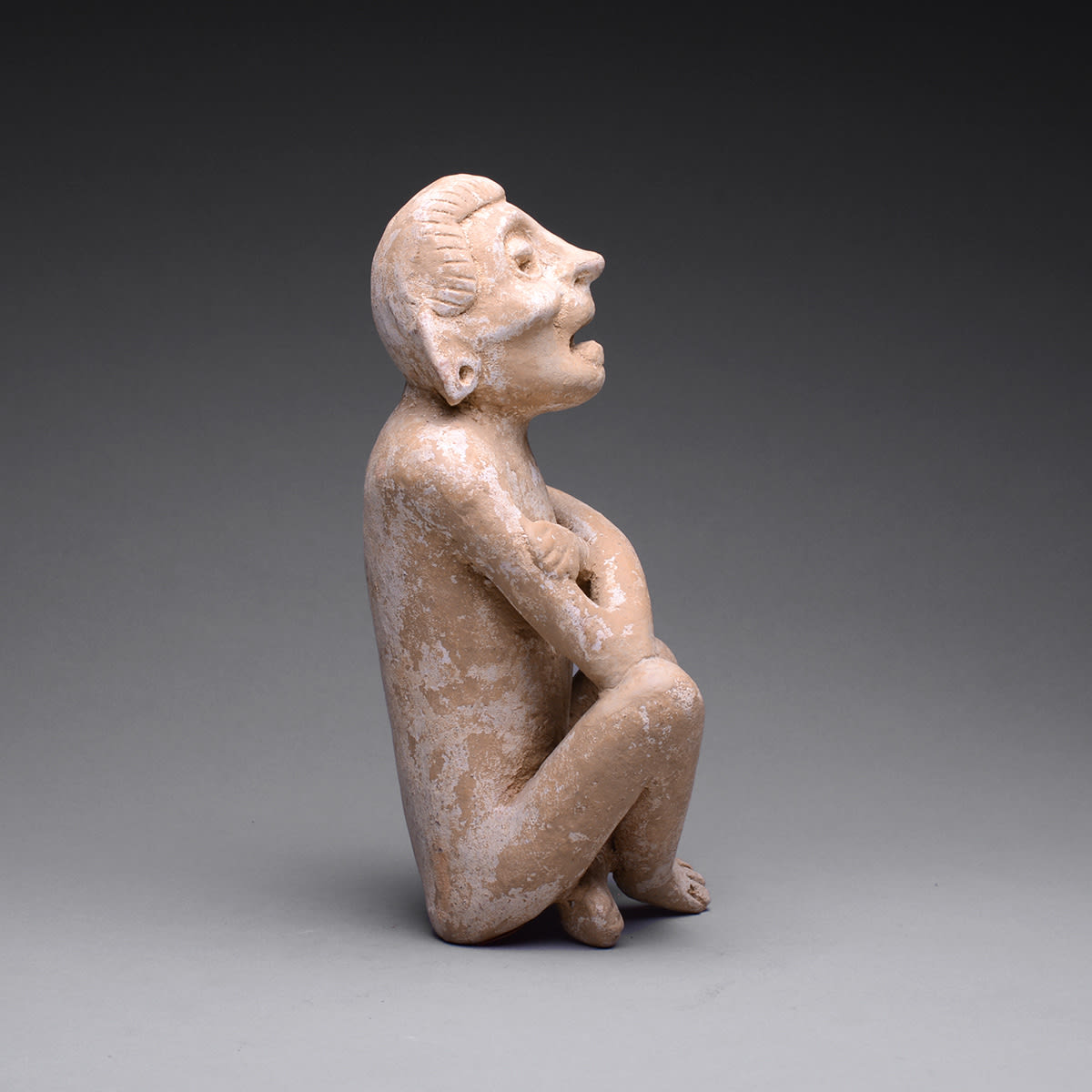 Mayan Sculpture of a Seated Deity/Shaman, 6th Century CE - 9th Century CE