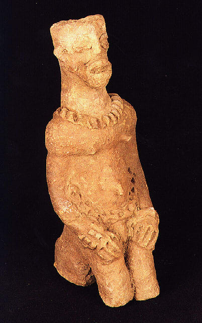 Komaland Sculpture of a Seated Man, 12th Century CE - 16th Century CE