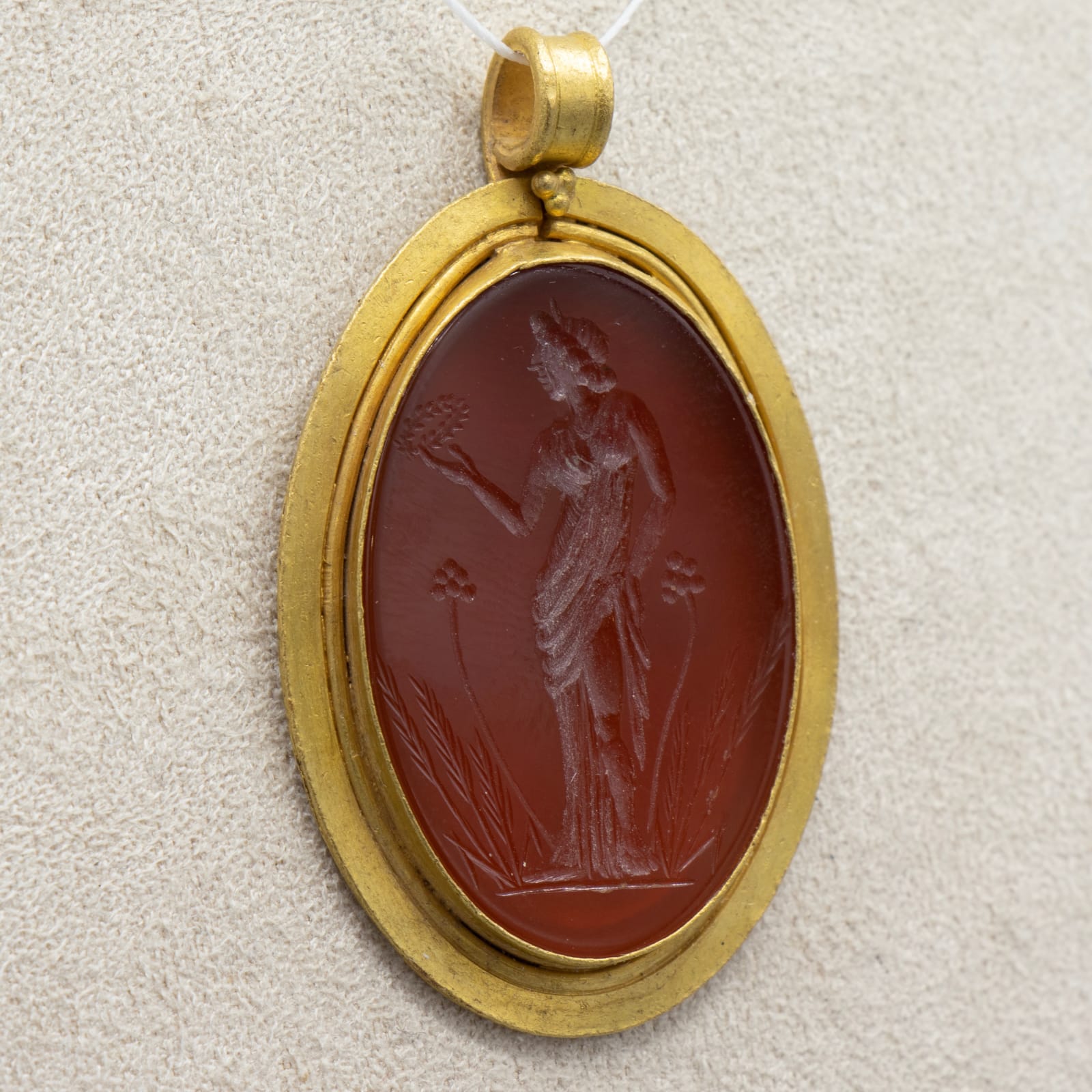 Classical Revival Intaglio Set in a Gold Pendant, 19th century CE