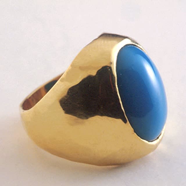 Cabochon Turquoise Set in a Gold Ring