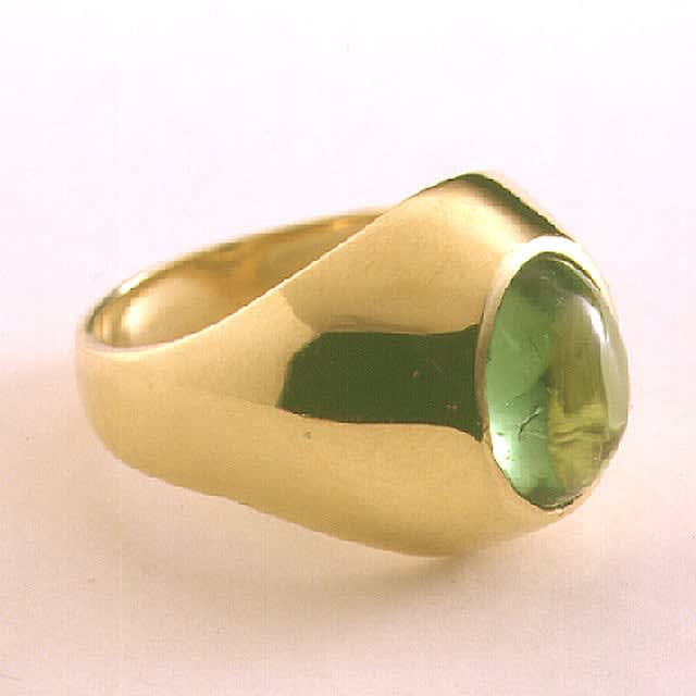 Green Cabochon Tourmaline Ring Weighing 2.5 Carats Set In 18 Karat Gold