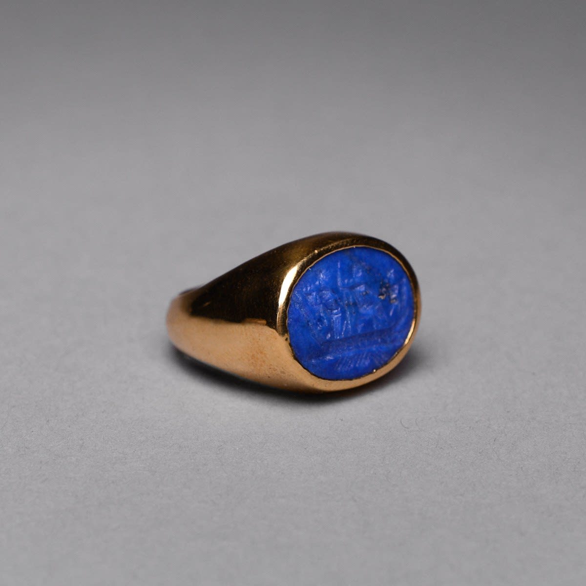 Gold Ring Featuring a Lapis Lazuli Intaglio of a Mythological Scene, 1700 CE - 1900 CE