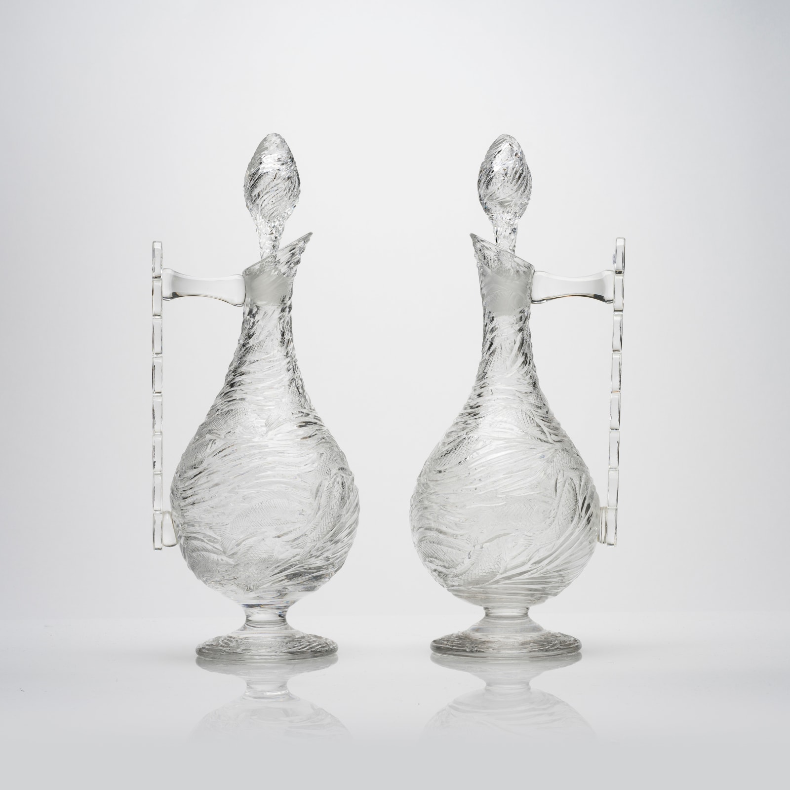 A Pair of Fatimid Style English Glass Ewers, 19th Century