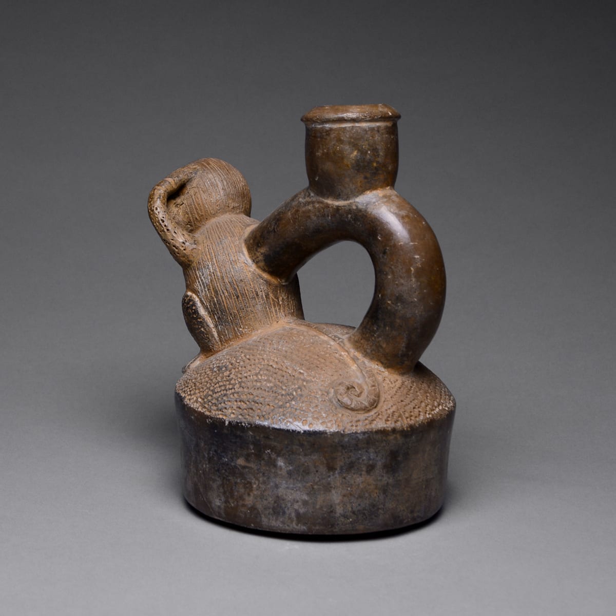 Chavin Greyware Stirrup Vessel Depicting a Monkey, 700 BCE - 300 BCE