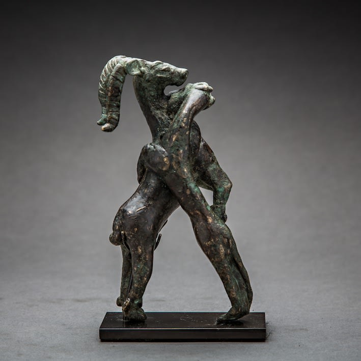 Elamite culture bronze figurine of a panther attacking a stag, 900 BCE - 600 BCE