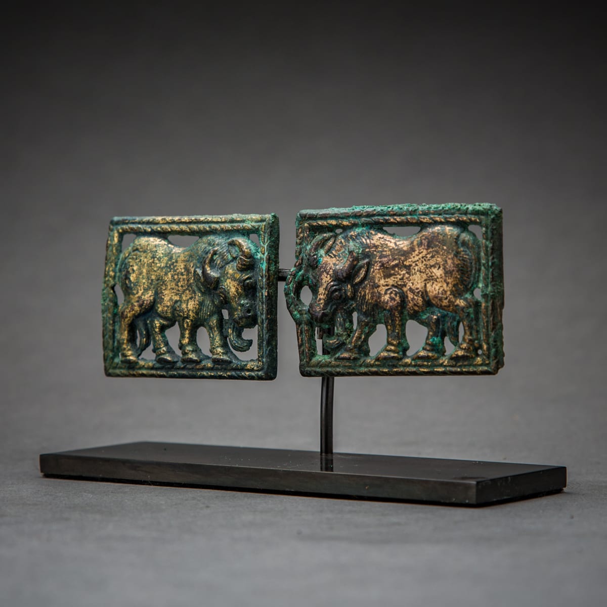 A Pair of Ordos Bronze Belt Buckle Plaques, 300 BCE - 100 BCE
