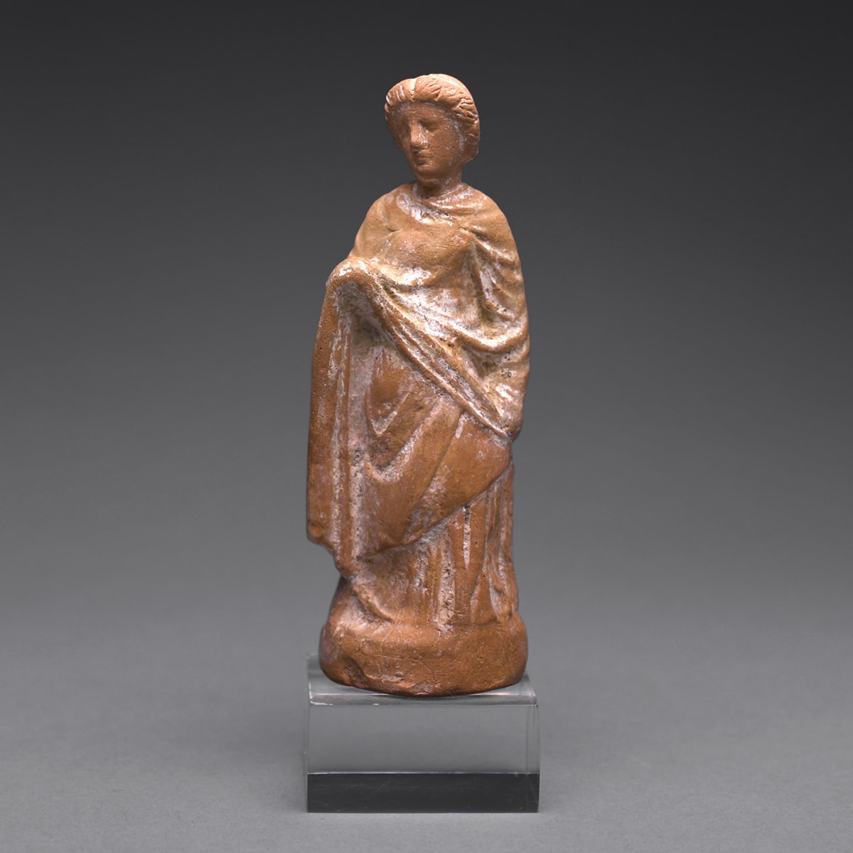 A Hellenistic Terracotta Statue of a Standing Woman