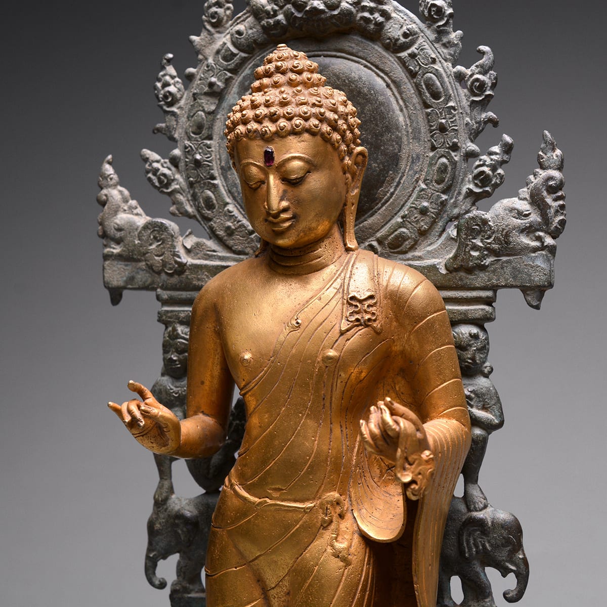 Indonesian Gold Sculpture of Buddha with a Bronze Base, 11th Century CE - 14th Century CE