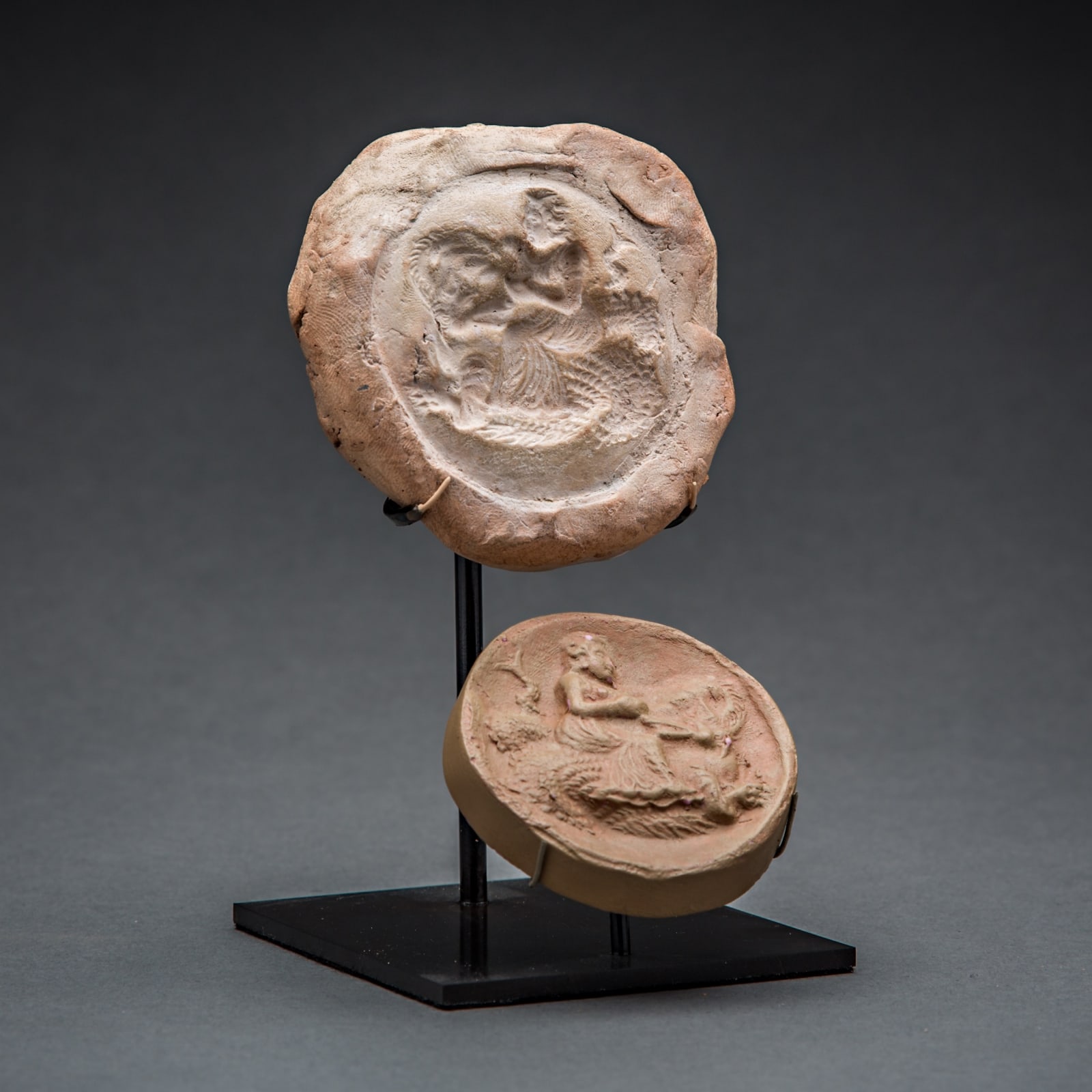Kushan Empire earthenware mould with the depiction of a Nereid on a sea monster, 100 CE - 300 CE