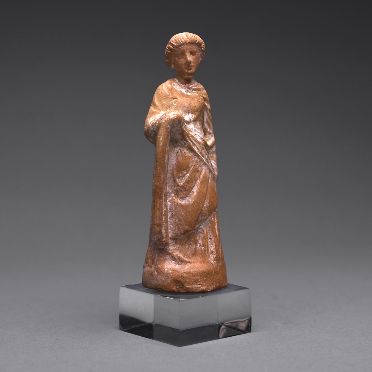 A Hellenistic Terracotta Statue of a Standing Woman
