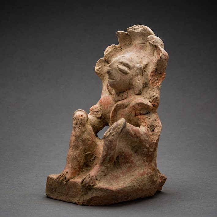Indus Valley Terracotta Figurine of a Seated Man Surmounted by a Cobra Umbrella, 2700 BCE