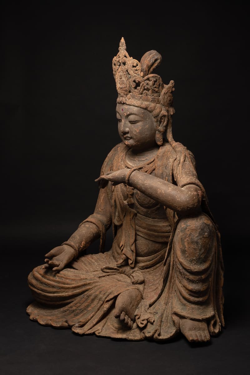 Ming Wooden seated Guanyin in relaxed posture, 11th Century CE - 17th Century CE