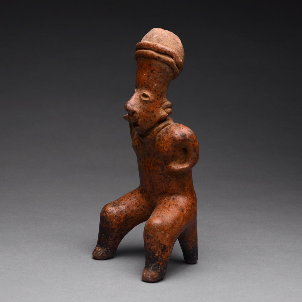 San Sebastián Style Nayarit Sculpture of Seated Woman Holding an Offering Bowl, 300 BCE - 300 CE