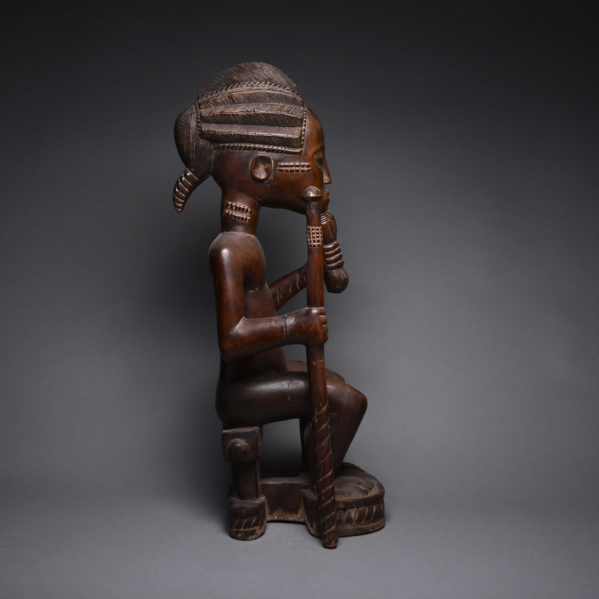 Baule Wooden Sculpture of a Chief Seated on a Throne, 20th Century CE
