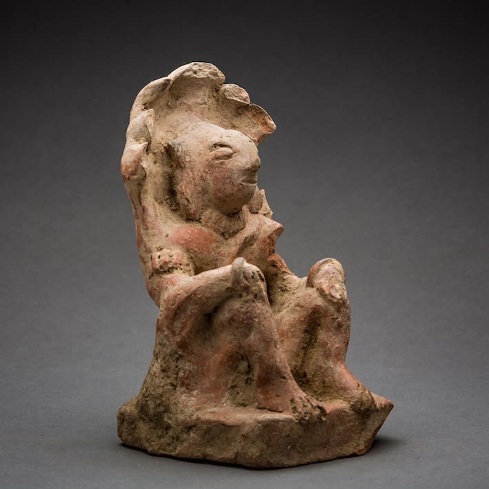 Indus Valley Terracotta Figurine of a Seated Man Surmounted by a Cobra Umbrella, 2700 BCE