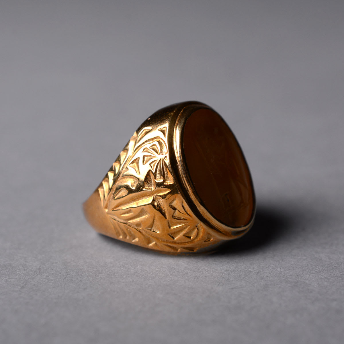 Roman Carnelian Intaglio Depicting a Man Flaying an animal, 100 CE - 300 CE