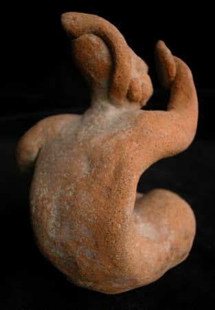 Sculpture of a Seated Woman Looking at a Mirror, 1200 BCE - 900 CE