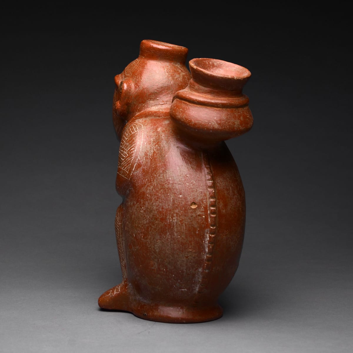 Vessel in the Form of a Man Carrying a Basket on his Back, 300 BCE - 500 CE