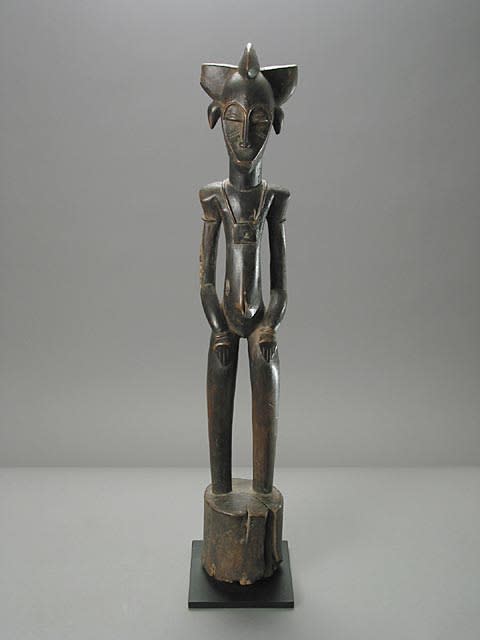 Male Senufo Wooden Pombiele Rhythm Pounder, 20th Century CE