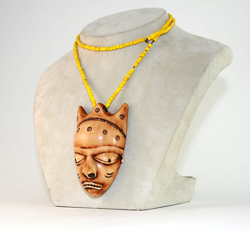 Pende Ivory Ikhoko Mask Pendant, 19th Century CE - 20th Century CE