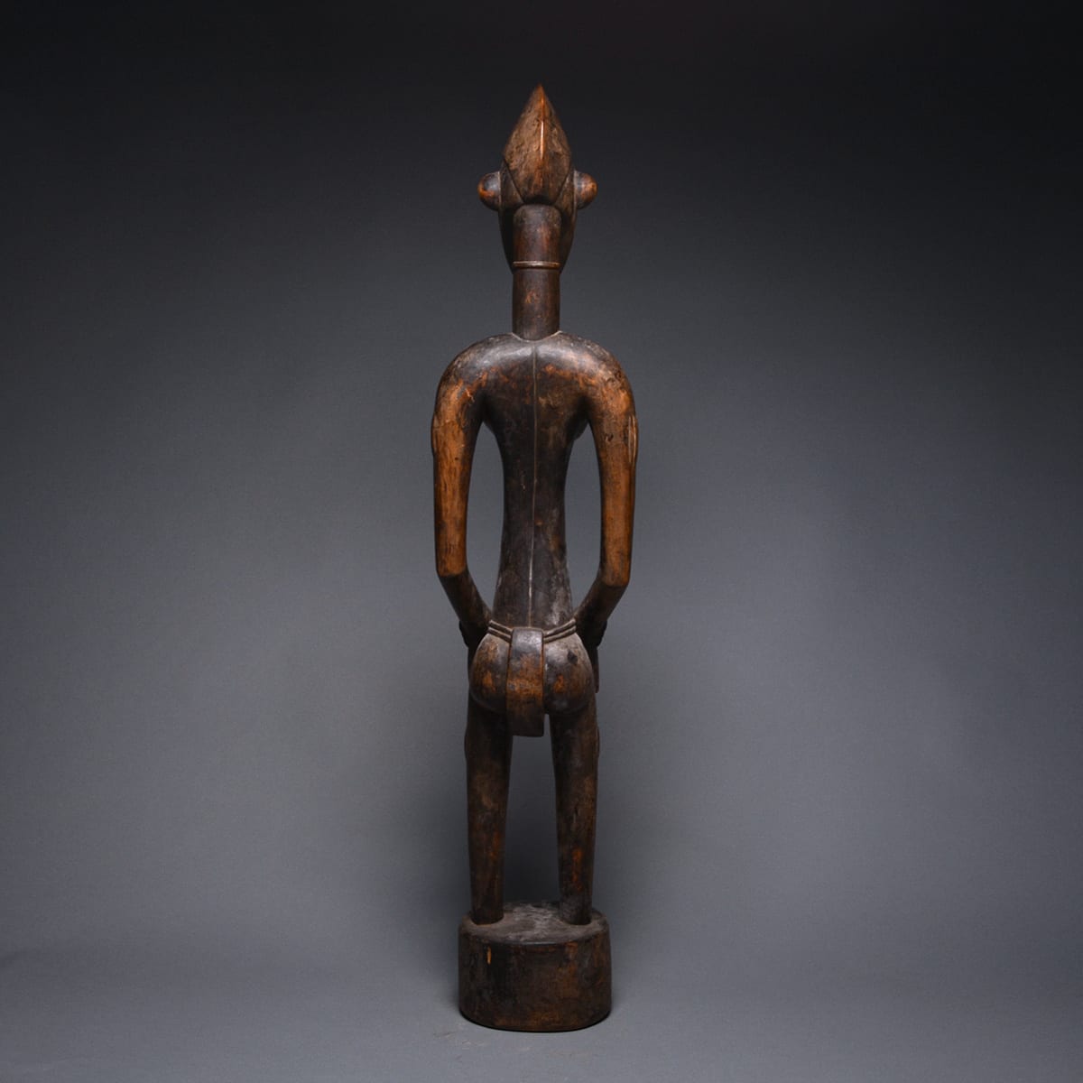 Female Senufo Wooden Pombilele Rhythm Pounder, 20th Century CE
