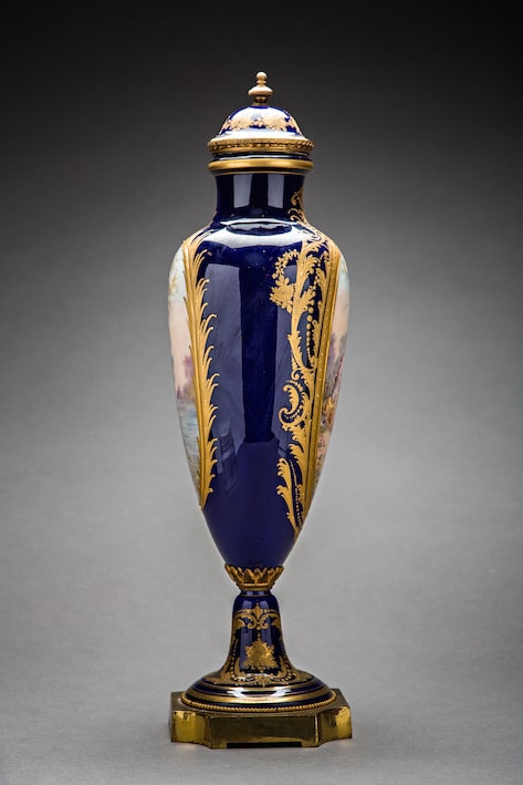 Pair of lidded French ormolu vases, 1900 BCE